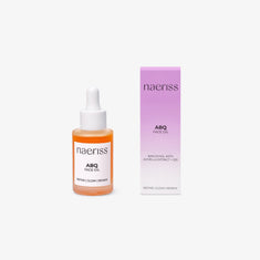 Naeriss ABQ Face Oil shown in a frosted glass dropper bottle with a rich orange hue, next to a purple gradient box labeled with bakuchiol, acmella extract, and coenzyme Q10. This antioxidant-rich facial oil is formulated to refine skin texture, promote glow, and support visible skin renewal.