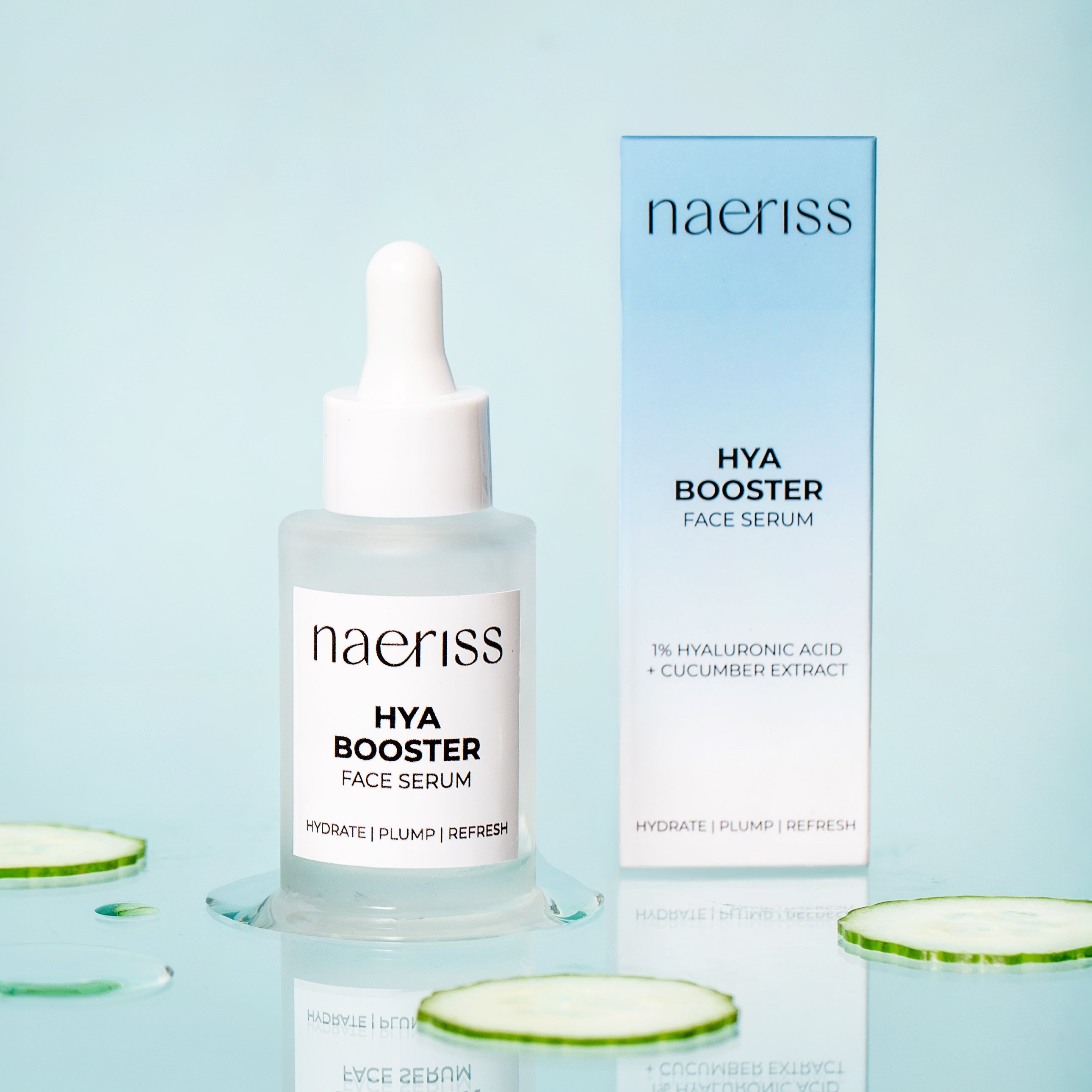 Naeriss Hya Booster Face Serum bottle and packaging on a light blue background with cucumbers.