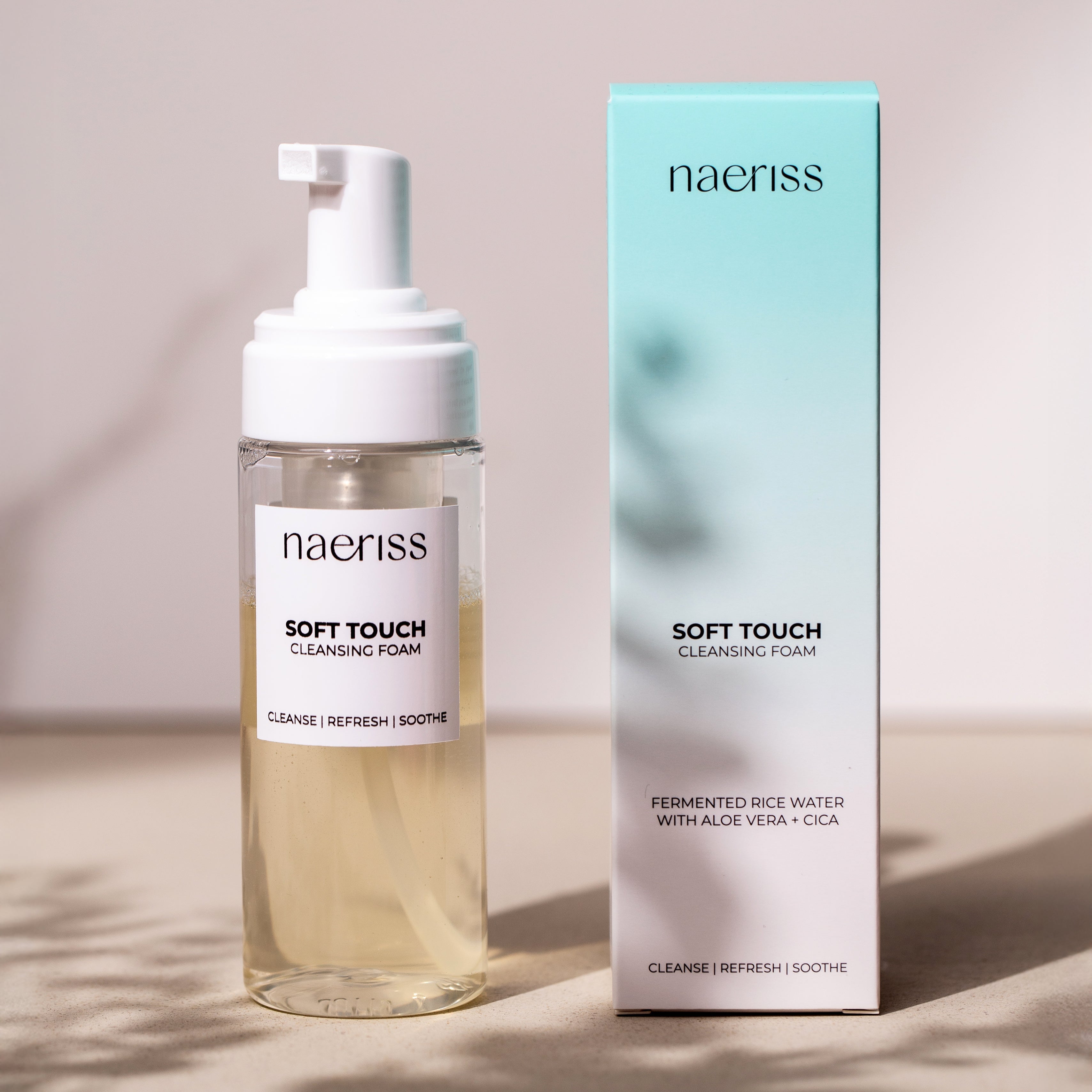 Naeriss Soft Touch Cleansing Foam bottle and packaging on a neutral background